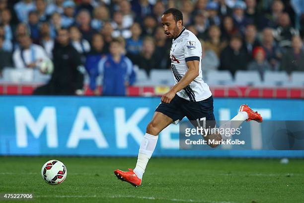 Andros Townsend of Tottenham Hotspur runs the ball during the international friendly match between Sydney FC and Tottenham Spurs at ANZ Stadium on...