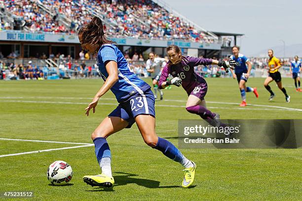 Forward Christen Press of the United States maneuvers around goal keeper Niamh Reid-Burke of Ireland to take a shot on goal in the second half of...