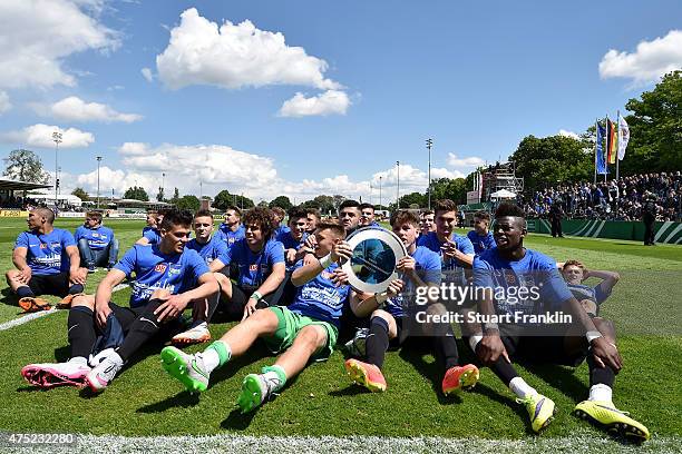 Players of Hertha BSC Berlin U19 celebrate with the trophy after winning the DFB Juniors Cup Final 2015 between Energie Cottbus U19 and Hertha BSC...