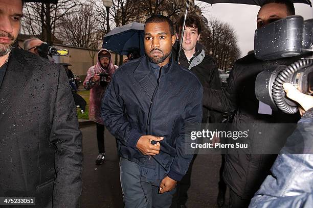 Kanye West attend the Balenciaga show as part of the Paris Fashion Week Womenswear Fall/Winter 2014-2015 on February 27, 2014 in Paris, France.