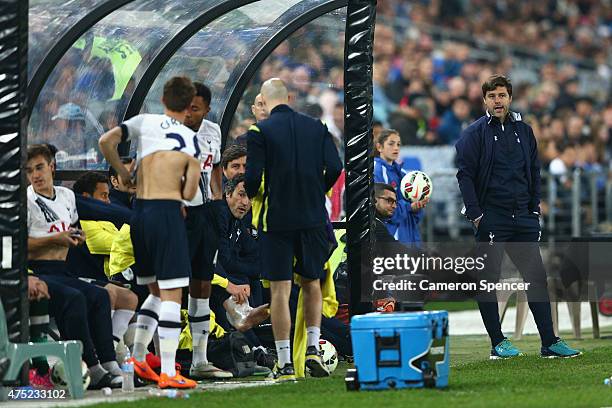 Hotspurs coach Mauricio Pochettino watches from the sideline during the international friendly match between Sydney FC and Tottenham Spurs at ANZ...