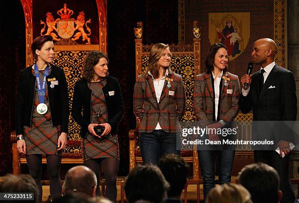 Skaters Jorien Ter Mors, Ireen Wurst, Lotte van Beek and Marrit Leenstra pose with their Ridder in de Orde van Oranje-Nassau or Knight in the Order...