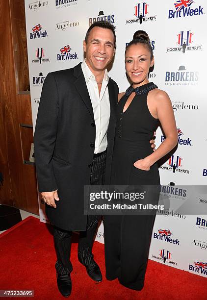 Actor Adrian Paul and Alexandra Tonelli attend the BritWeek Oscar Party at Hooray Henry's on February 26, 2014 in West Hollywood, California.