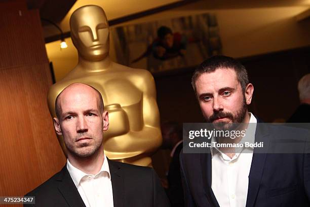Nominees Richard Rowley and Jeremy Scahill attend the 86th Annual Academy Awards Documentaries held at the AMPAS Samuel Goldwyn Theater on February...