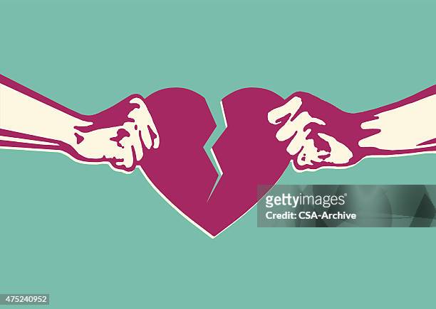 two hands tearing heart in two - divorce stock illustrations