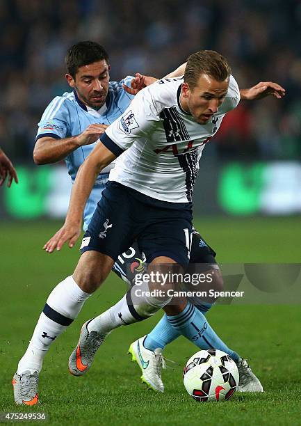 Harry Kane of Hotspur contests the ball with Peter Triantis of Sydney FC during the international friendly match between Sydney FC and Tottenham...