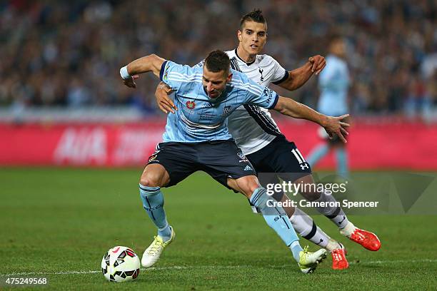 Nikola Petkovic of Sydney FC and Erik Lamela of Hotspur contest the ball during the international friendly match between Sydney FC and Tottenham...