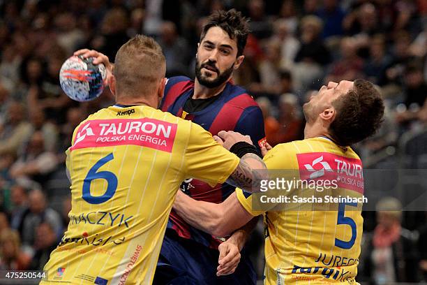 Raul Entrerrios Rodriguez of Barcelona controls the ball during the "VELUX EHF FINAL4" semi final match FC Barcelona and KS Vive Tauron Kielce at...