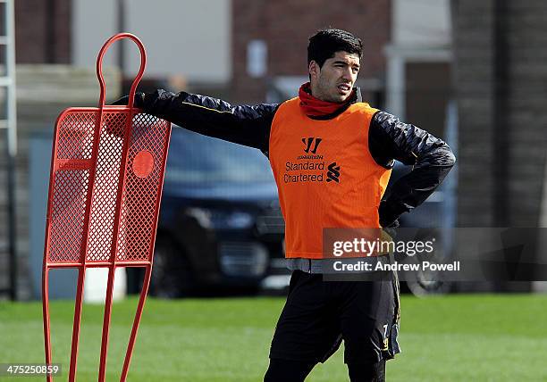 Luis Suarez of Liverpool in action during a training session at Melwood Training Ground on February 27, 2014 in Liverpool, England.