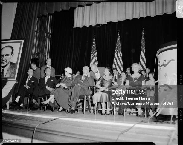 Men and women seated on stage, from left: unknown, Joseph S Clark, Alyce Lawrence, Pittsburgh Mayor David L Lawrence, Molly Yard, and Eleanor...