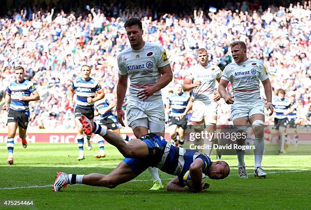 Jonathan Joseph of Bath dives over to score his team's opening try during the Aviva Premiership Final between Bath Rugby and Saracens at Twickenham...