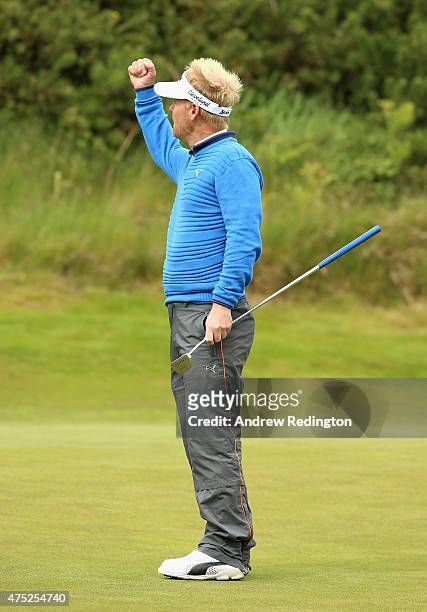 Soren Kjeldsen of Denmark reacts to a birdie putt on the13th green during the Third Round of the Dubai Duty Free Irish Open Hosted by the Rory...