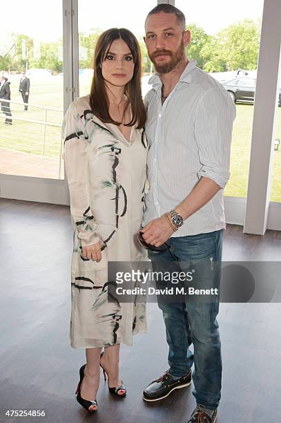Charlotte Riley and Tom Hardy attend day one of the Audi Polo Challenge at Coworth Park on May 30, 2015 in London, England.