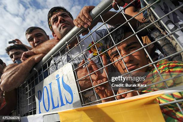 Supporters of Selahattin Demirtas, co-chairman of the pro-Kurdish People's Democratic Party , attend an election rally ahead of Turkey's June 7...