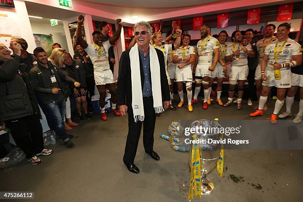 Saracens Chairman Nigel Wray congratulates the players following their 28-16 victory during the Aviva Premiership Final between Bath Rugby and...