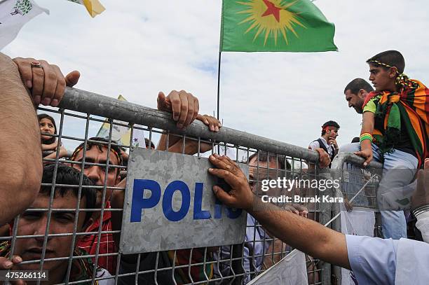 Supporters of Selahattin Demirtas, co-chairman of the pro-Kurdish People's Democratic Party , attend an election rally ahead of Turkey's June 7...