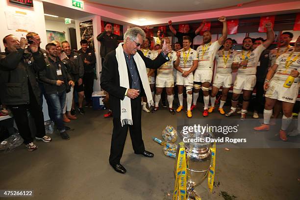 Saracens Chairman Nigel Wray congratulates the players following their 28-16 victory during the Aviva Premiership Final between Bath Rugby and...