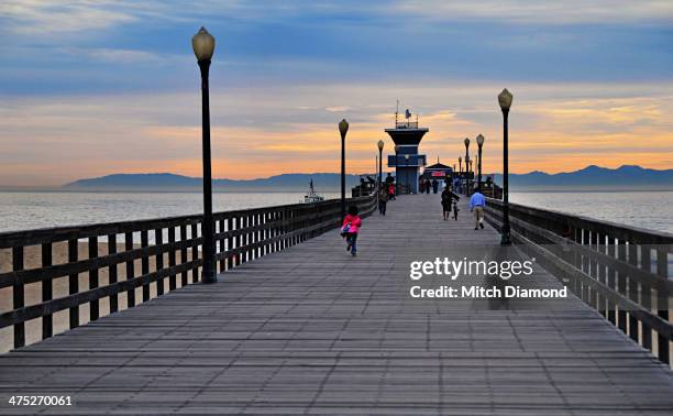 seal beach pier and lights - seal beach stock pictures, royalty-free photos & images