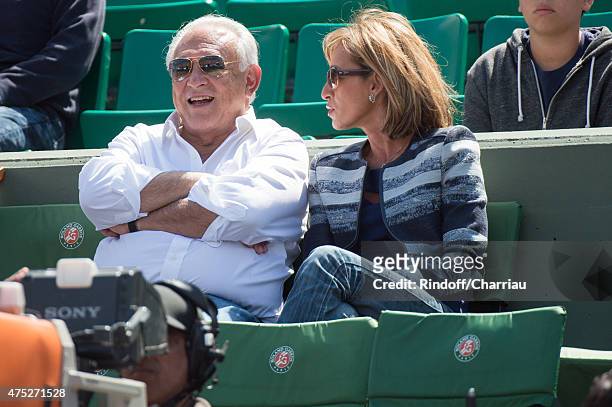 Dominique Strauss Kahn and Myriam L'Aouffir attend the French Open 2015 at Roland Garros on May 30, 2015 in Paris, France.