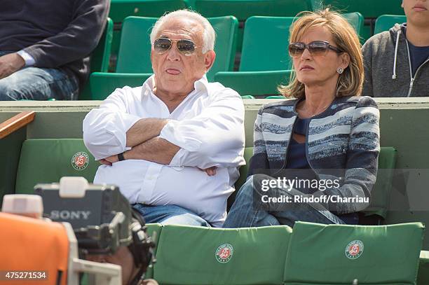 Dominique Strauss Kahn and Myriam L'Aouffir attend the French Open 2015 at Roland Garros on May 30, 2015 in Paris, France.