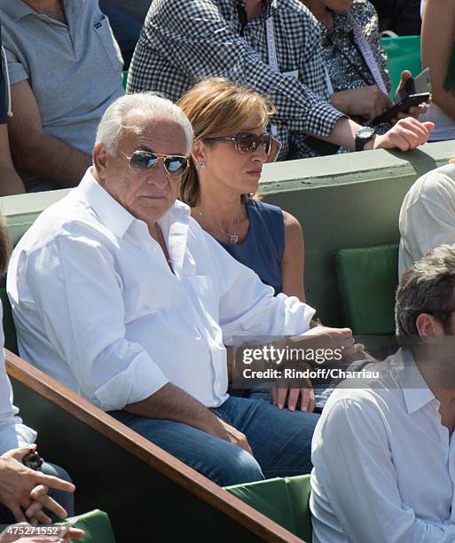 Dominique Strauss Kahn and Myriam L'Aouffir attend the French Open 2015 at Roland Garros on May 30, 2015 in Paris, France.