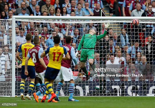 Alexis Sanchez of Arsenal scores their second goal past goalkeeper Shay Given of Aston Villa during the FA Cup Final between Aston Villa and Arsenal...