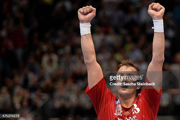 Momir Ilic of Veszprem reacts after winning the "VELUX EHF FINAL4" semi final match against THW Kiel at Lanxess Arena on May 30, 2015 in Cologne,...