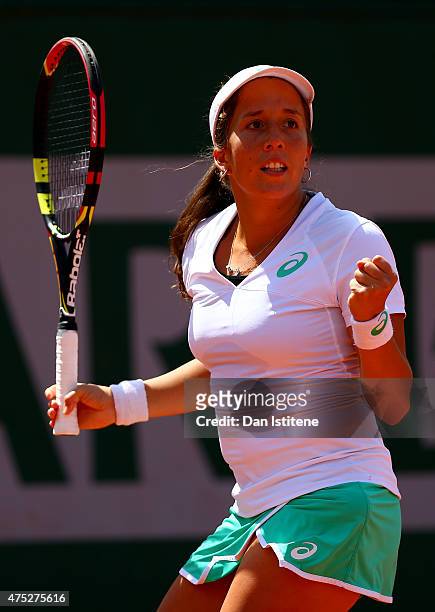 Irina Falconi of the United States celebrates a point during her women's singles match against Julia Goerges of Germany on day seven of the 2015...