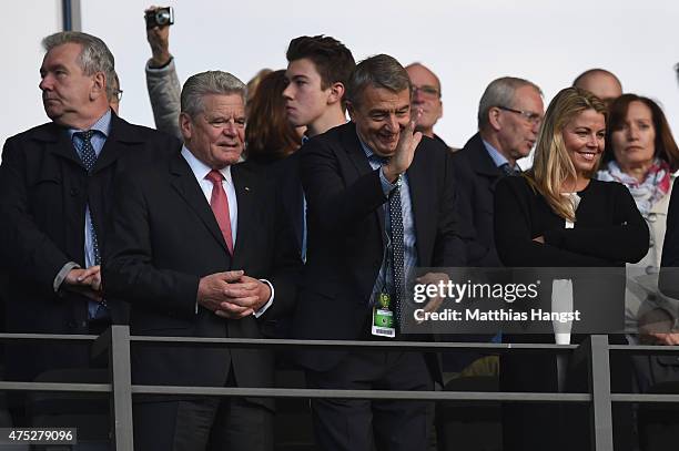 German President Joachim Gauck, DFB President Wolfgang Niersbach and his partner Marion Popp enjoy the atmosphere ahead of the DFB Cup Final match...