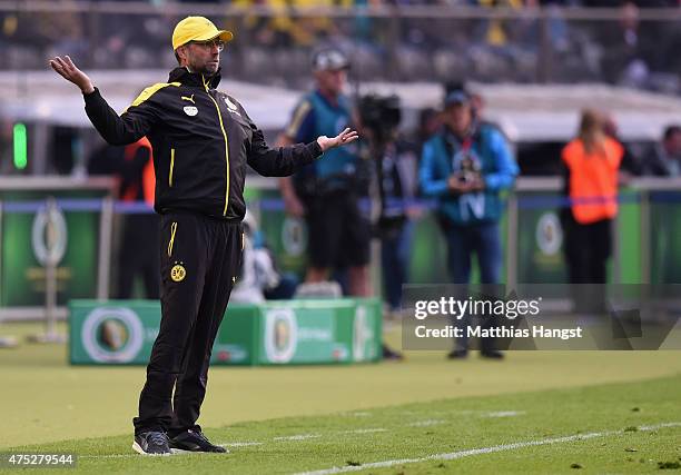 Head coach Juergen Klopp of Borussia Dortmund gestures during the DFB Cup Final match between Borussia Dortmund and VfL Wolfsburg at Olympiastadion...