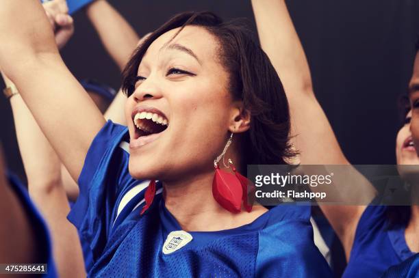 crowd of sports fans cheering - sport venue stock pictures, royalty-free photos & images