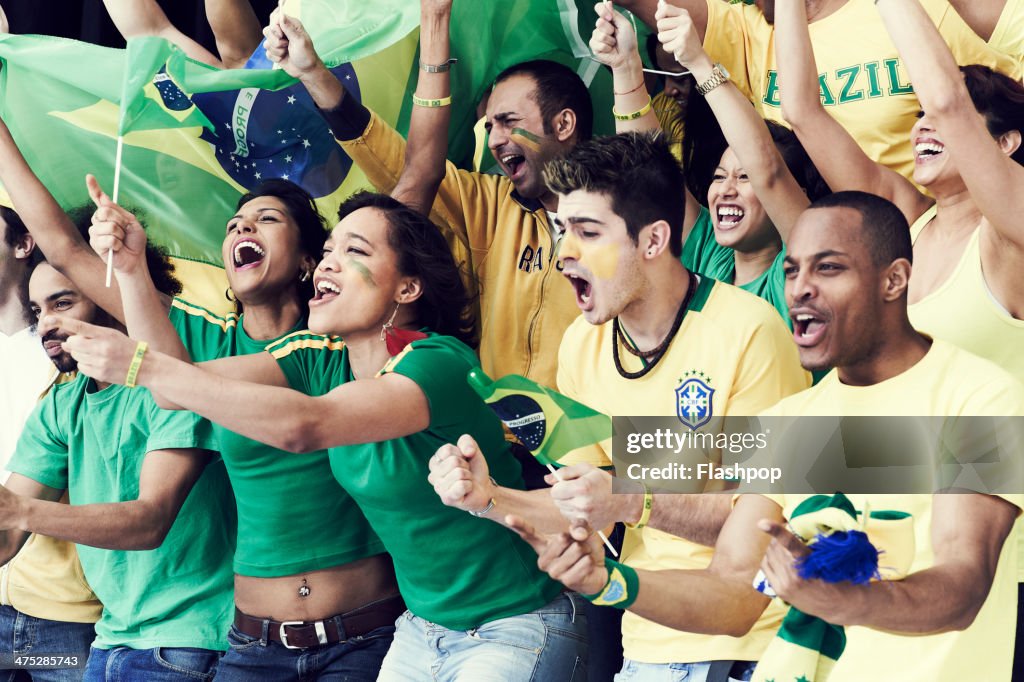 Crowd of Brazilian fans cheering