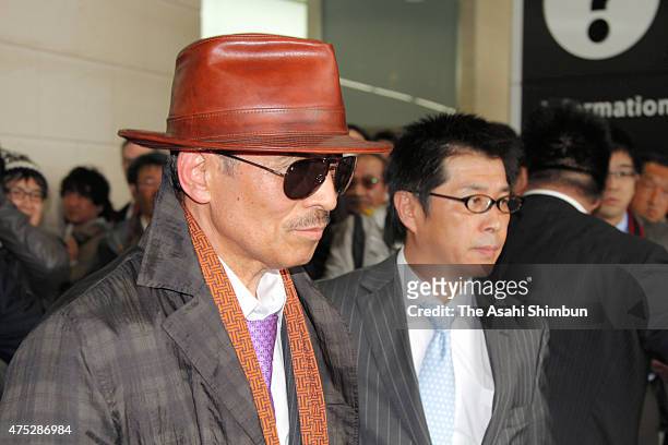Japan's biggest yakuza syndicate head Kenichi Shinoda, aka Shinobu Tsukasa is seen on arrival at Kobe station after being released from jail as he...