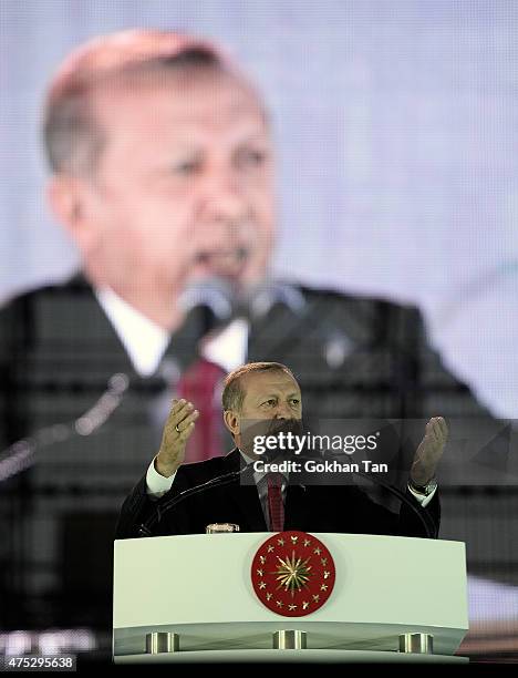 Turkey's President Tayyip Erdogan addresses his supporters during a ceremony to mark the 562nd anniversary of the conquest of the city by Ottoman...