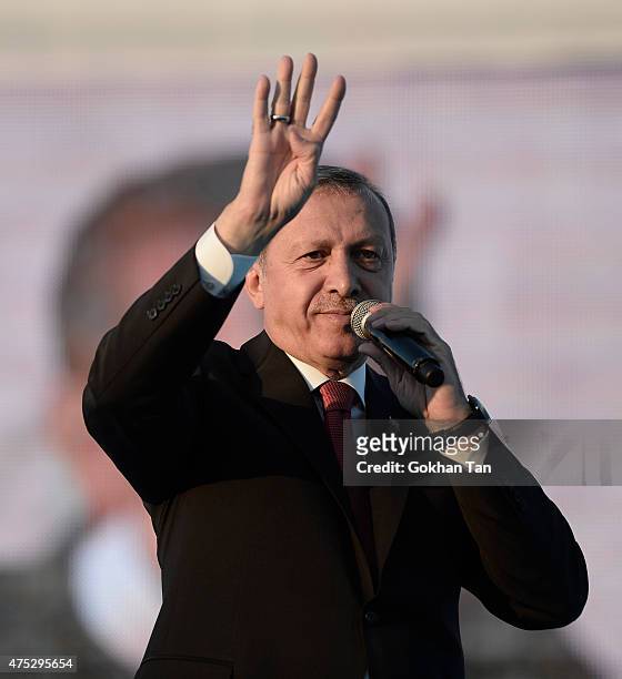 Turkey's President Tayyip Erdogan addresses his supporters during a ceremony to mark the 562nd anniversary of the conquest of the city by Ottoman...