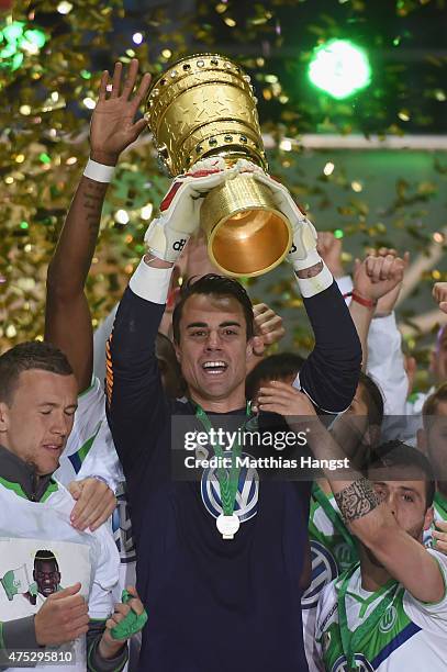 Diego Benaglio of VfL Wolfsburg lifts the trophy after his teams victory in the DFB Cup Final match between Borussia Dortmund and VfL Wolfsburg at...