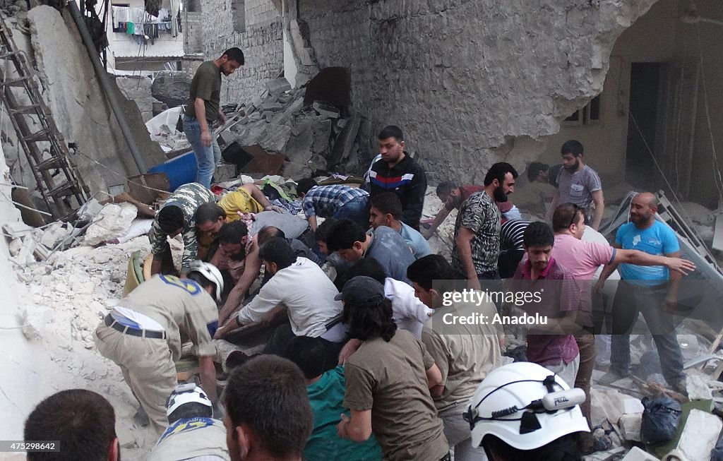 Search and rescue works after barrel bomb attack in Aleppo