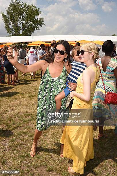 Rebecca Minkoff and Emma Roberts attend the Eighth-Annual Veuve Clicquot Polo Classic at Liberty State Park on May 30, 2015 in Jersey City, New...