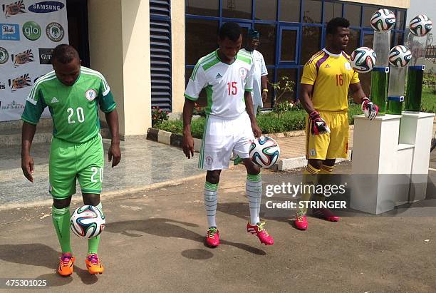 Three Super Eagles, name of the Nigerian national football team, midfielder Abdullahi Shehu , striker Ejike Uzuoenyi and keeper Chigozie Agbim juggle...