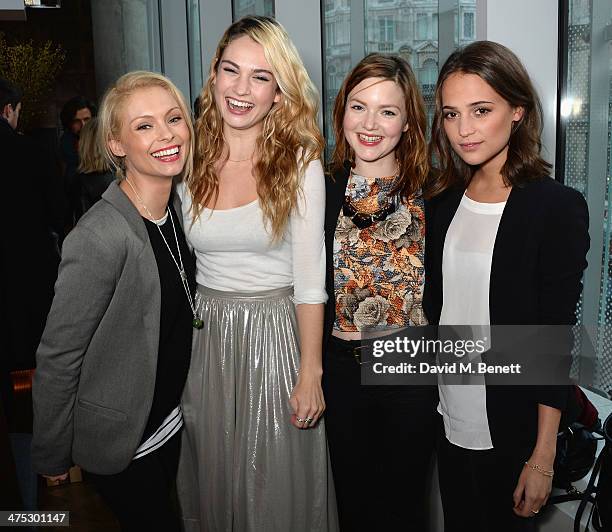 Myanna Buring, Lily James, Holliday Grainger and Alicia Vikander attend a VIP screening of Harvey Weinstein's "Escape From Planet Earth" at The W...