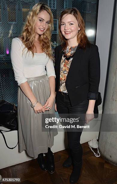 Lily James and Holliday Grainger attend a VIP screening of Harvey Weinstein's "Escape From Planet Earth" at The W Hotel on February 27, 2014 in...