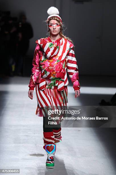 Model walks the runway during the Manish Arora show as part of the Paris Fashion Week Womenswear Fall/Winter 2014-2015 on February 27, 2014 in Paris,...