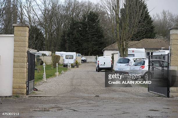 View of travellers' site on February 27, 2014 in Vernouillet, outside Paris. Four people were arrested by police forces supported by the RAID special...