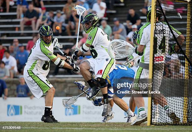 Kevin Unterstein of the New York Lizards collides with John Haus at the goal during their game at American Legion Memorial Stadium on May 30, 2015 in...