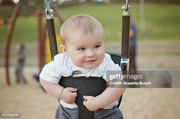 Baby On A Swing High-Res Stock Photo