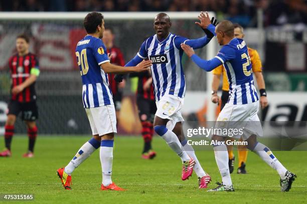 Eliaquim Mangala of Porto celebrates his team's second goal with team mates Carlos Eduardo and Fernando during the UEFA Europa League Round of 32...