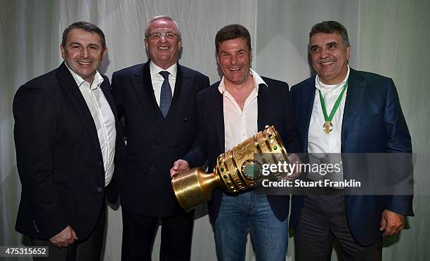 Manager Klaus Allofs of Wolfsburg, executive chairman of the directors of Volkswagen Martin Winterkorn , head coach of VfL Wolfsburg Dieter Hecking...