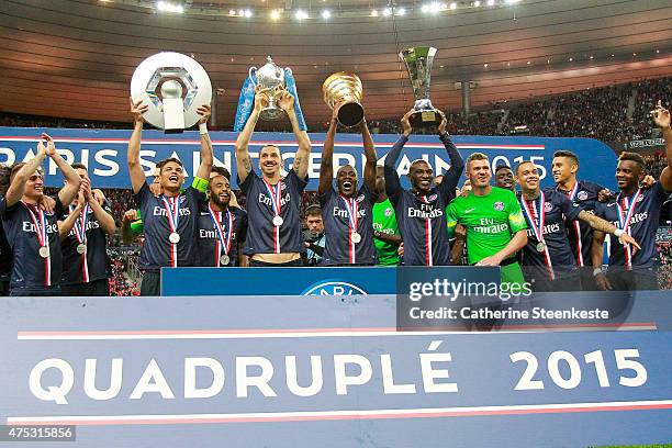 Thiago Silva with the League 1 Championship Trophy , Zlatan Ibrahimovic and the French Cup, Blaise Matuidi with the Coupe de la Ligue Trophy and...