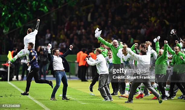 Dieter Hecking, head cosch of Wolfsburg celebrates winning at the end of the DFB Cup Final between Borussia Dortmund and VfL Wolfsburg at...