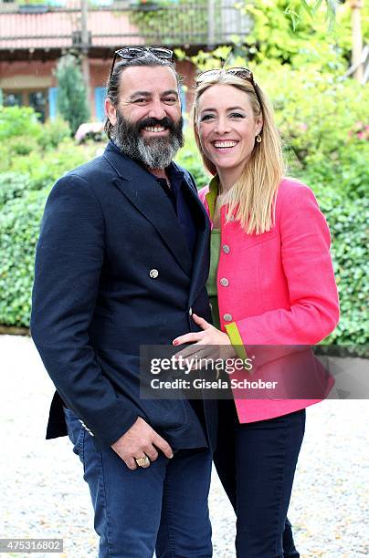 Artist Mauro Bergonzoli and his partner Franziska Fugger - Babenhausen during the Mauro Bergonzoli Country Life Studio Opening on May 30, 2015 in...